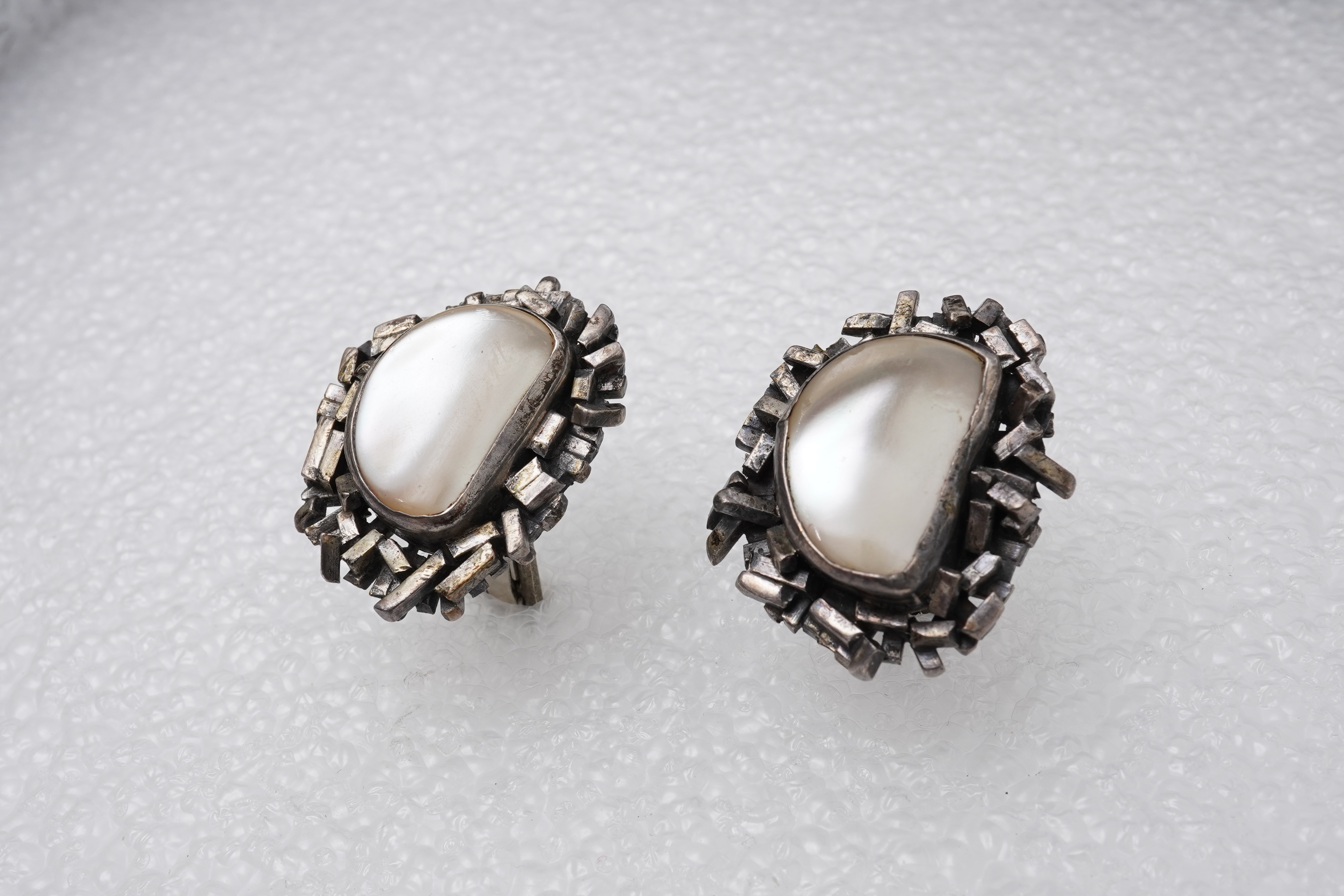 Attributed to Rachel Gera (1936-2023), a pair of mother of pearl cufflinks, Israel, 1970s